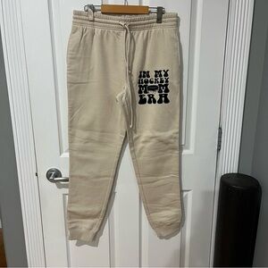 Cream Sweatpants with Black Graphic